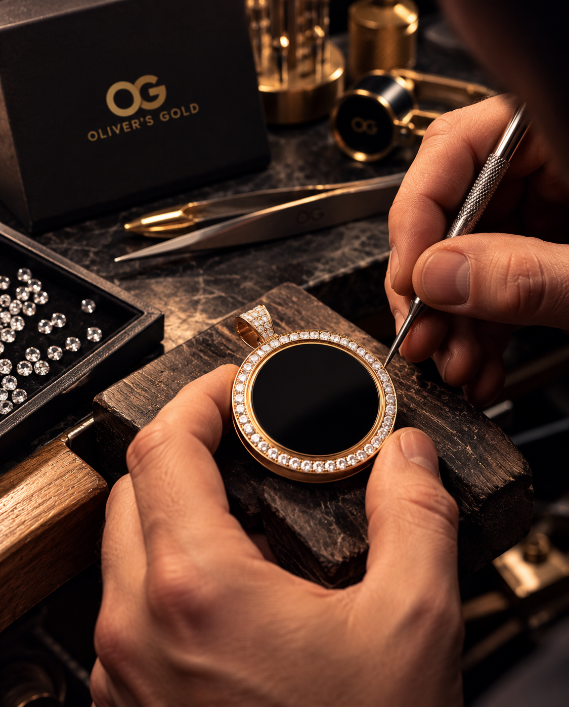 A jeweller setting a stone into the medallion at a workbench