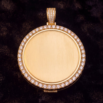 The brushed gold reverse of the medallion, where the engraving goes