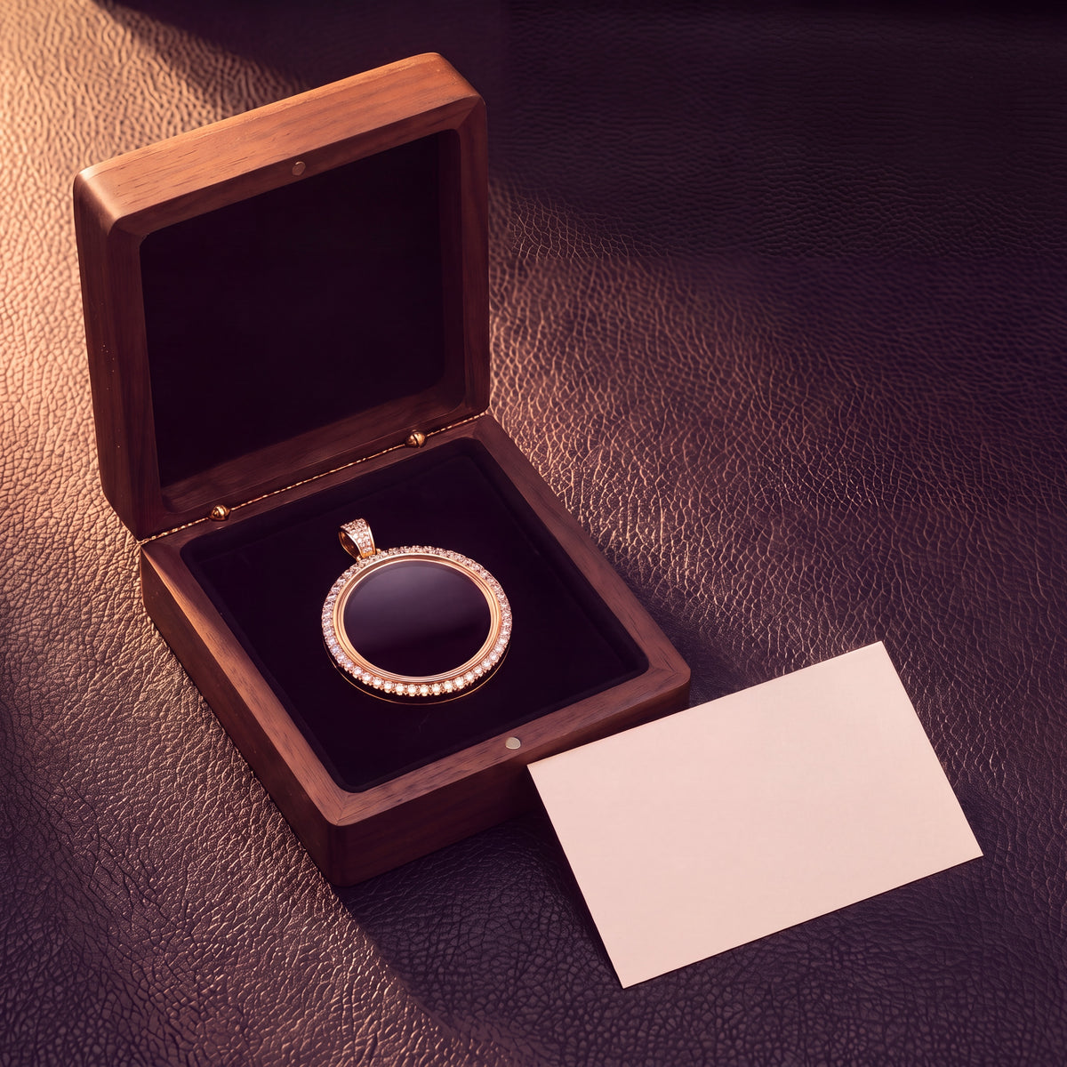 The medallion in an open presentation box beside a blank card