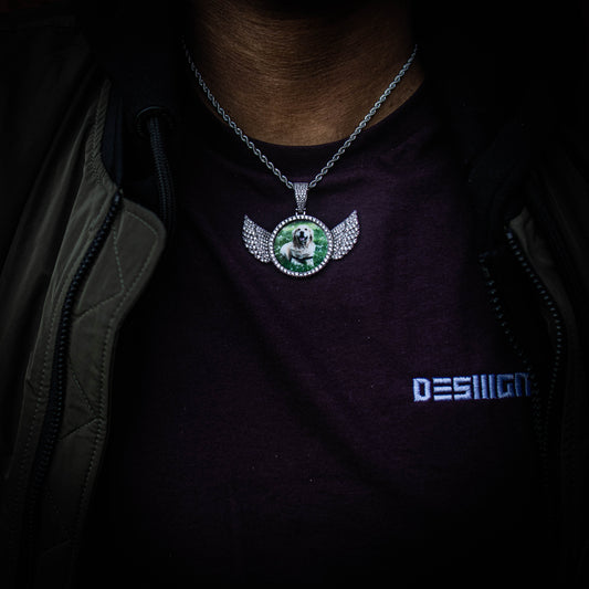 THE HIGH FLYER // WINGS PHOTO PENDANT is an essential piece to add to your collection to remember an OG in your life...5x Plated with Solid 18k Gold x Diamonds, this custom photo pendant has a breathtaking luster for a price that you simply can't find anywhere else. Stop Settling and Shop OG.
